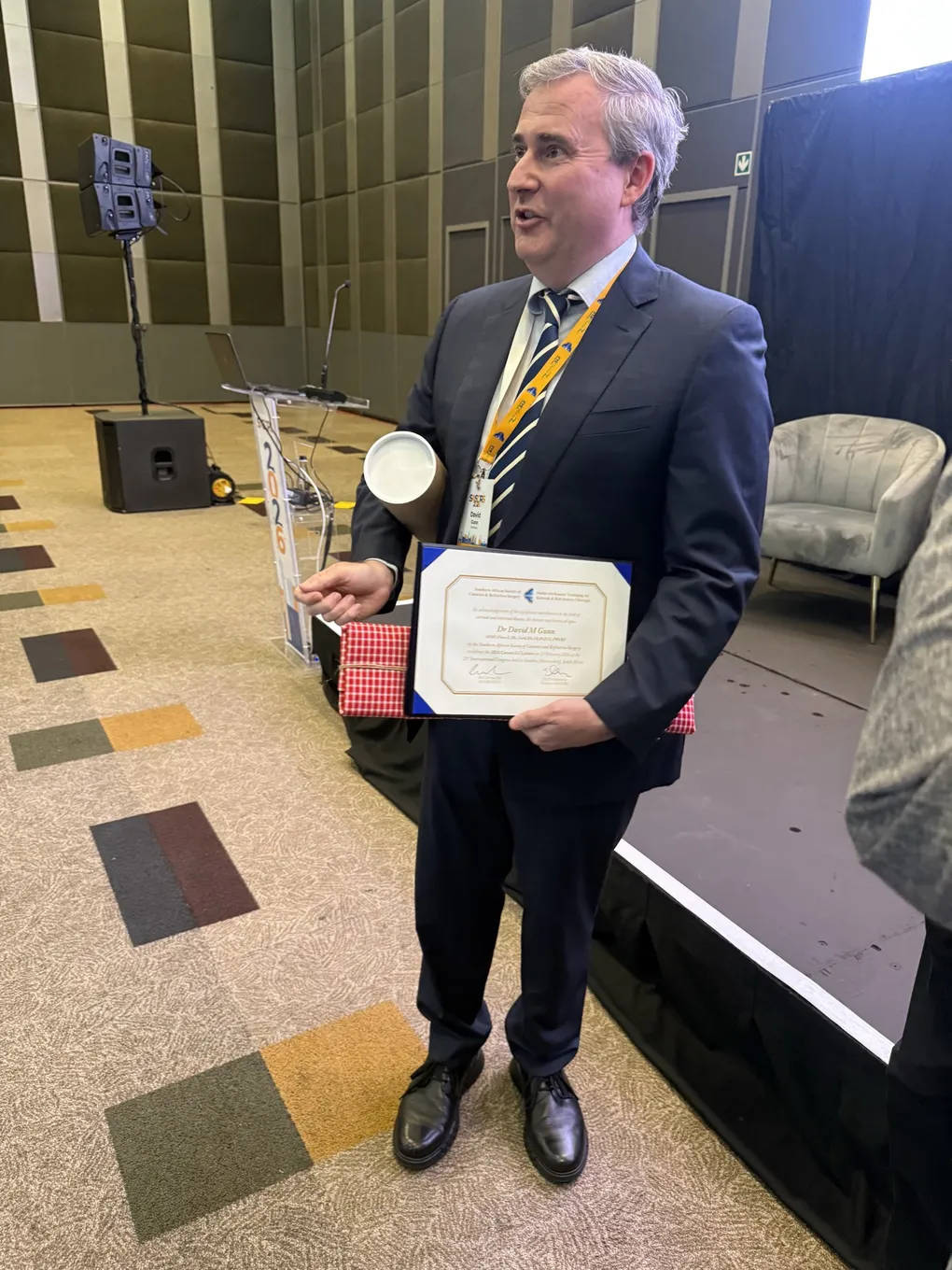 Dr David Gunn with the 2026 Cornea SA Lecture certificate at the 21st SASCRS International Congress, Sandton Convention Centre, Johannesburg.