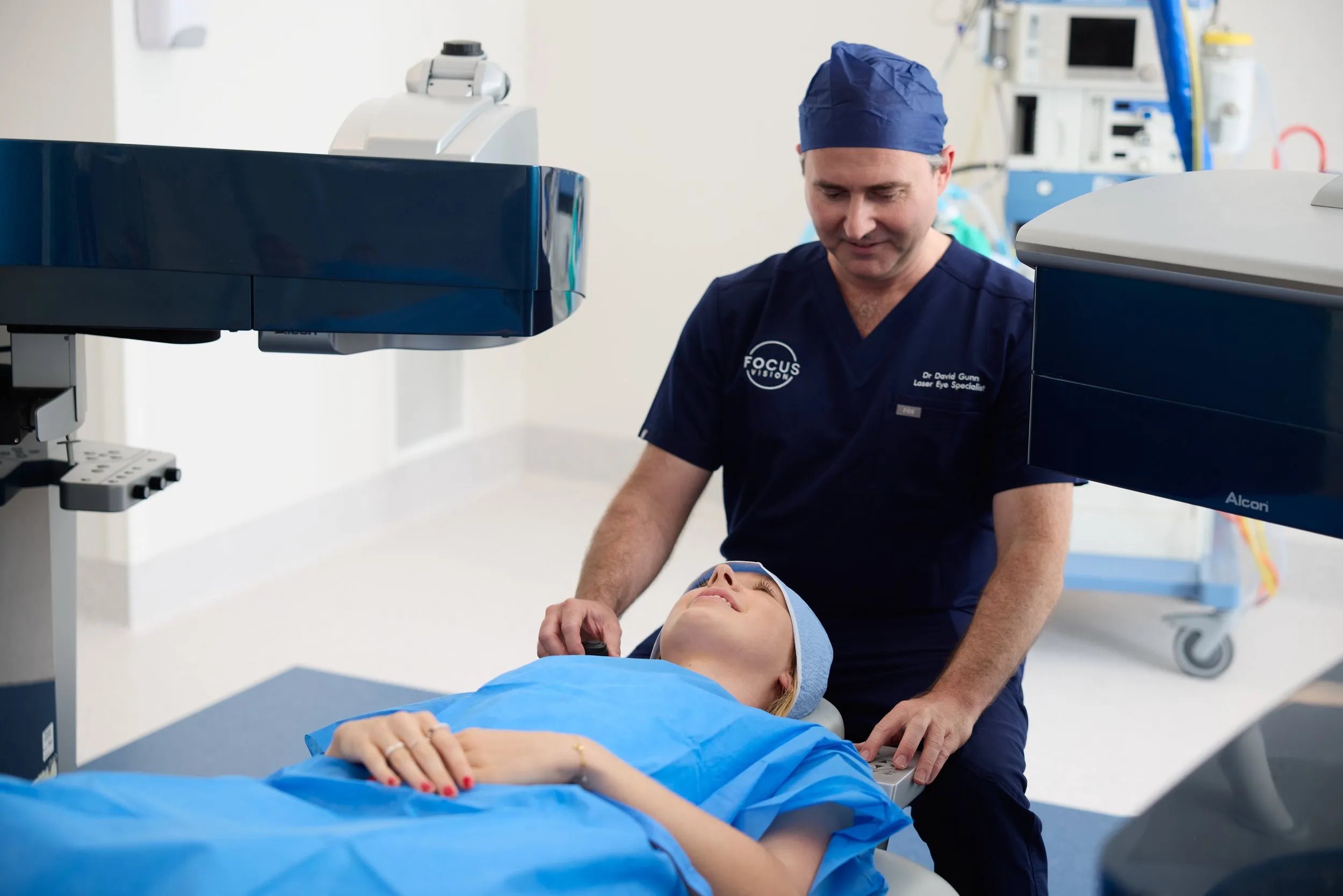Dr. David Gunn preparing a patient for premium cataract surgery using Alcon equipment in Brisbane.